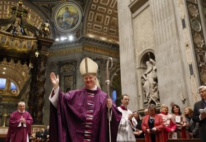 Newly ordained Bishop Paul Tighe, a priest of the Archdiocese of Dublin, greets the faithful during his ordination to the episcopate in St. Peter's Basilica at the Vatican Feb. 27, 2016. (Photo courtesy Paul Haring, Catholic News Service)