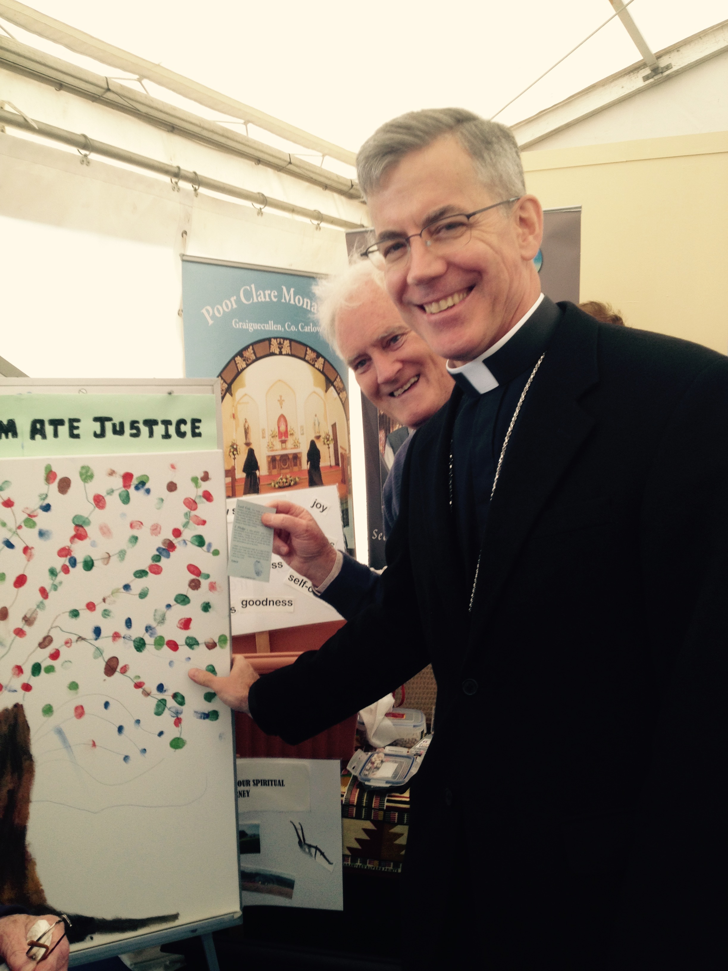 His Excellency Archbishop Charles Brown adds his mark to the SMA thumbprint campaign